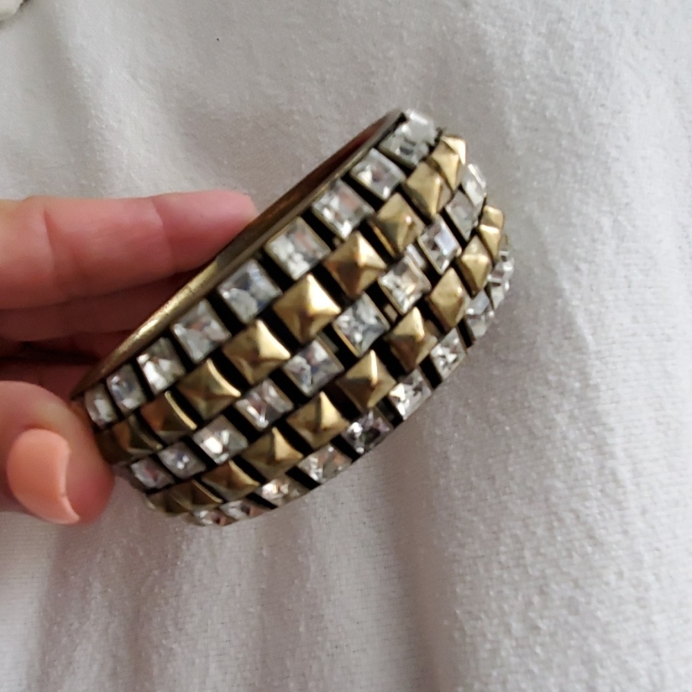 Bracelet with gold studs with rhinestones